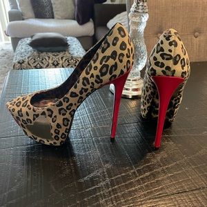 Rare pair Betsey Johnson. Leopard design, red heels & peep toes, gold heart.